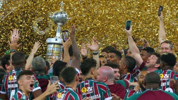 Jogadores do Fluminense comemoram a conquista da CONMEBOL Libertadores PABLO PORCIUNCULA/AFP via Getty Images